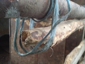 Oops... horse sat on the fence! A quick 'for now' repair job in sad need of repair!