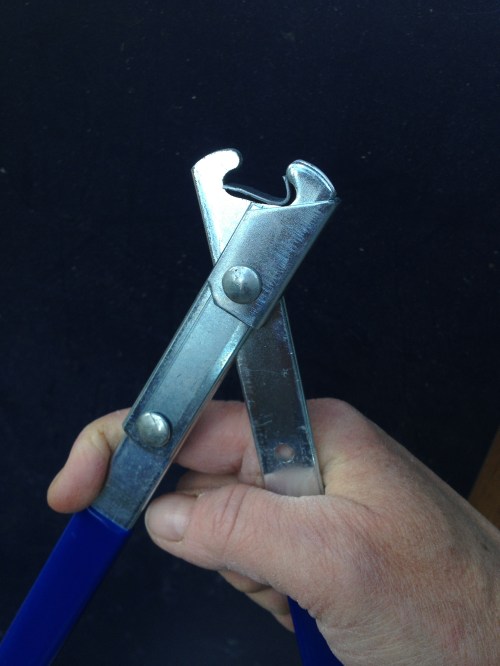 Here, a crimpy thing (purchasable in bulk by weight at the feed store) is loaded into the crimper tool...